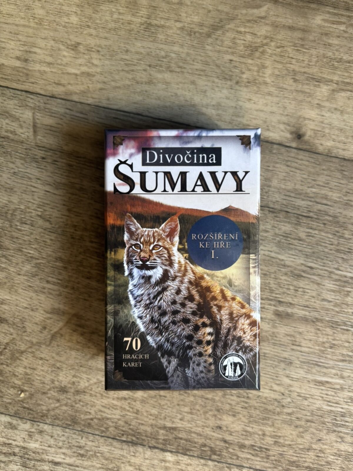 krabička s obrázkem rysa a nápisem Divočina Šumavy